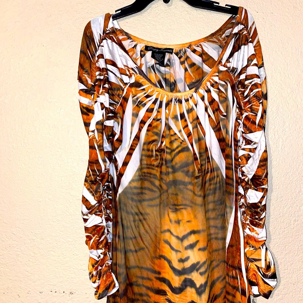 Cheetah print long sleeve blouse.